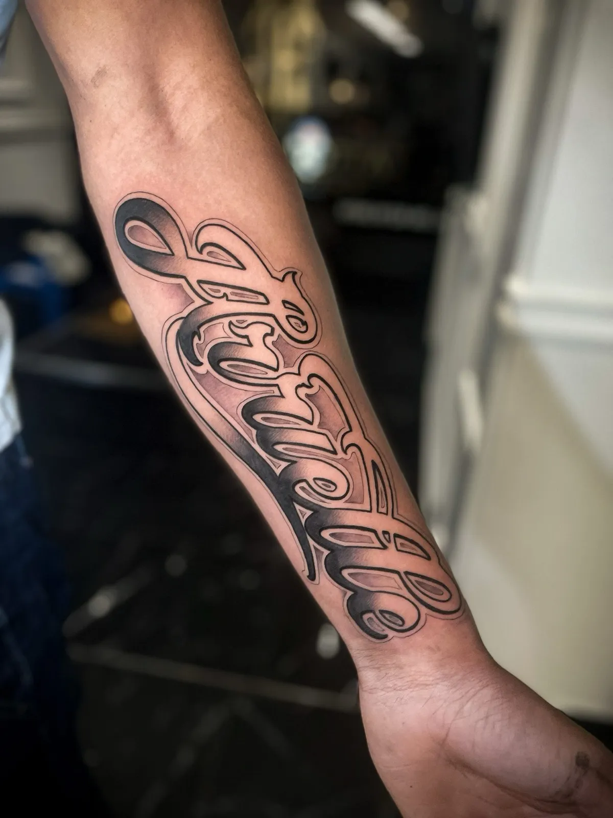 Lettering tattoo bij Tattoo Heaven